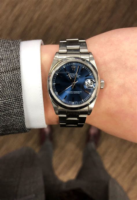 31mm rolex on mans wrist